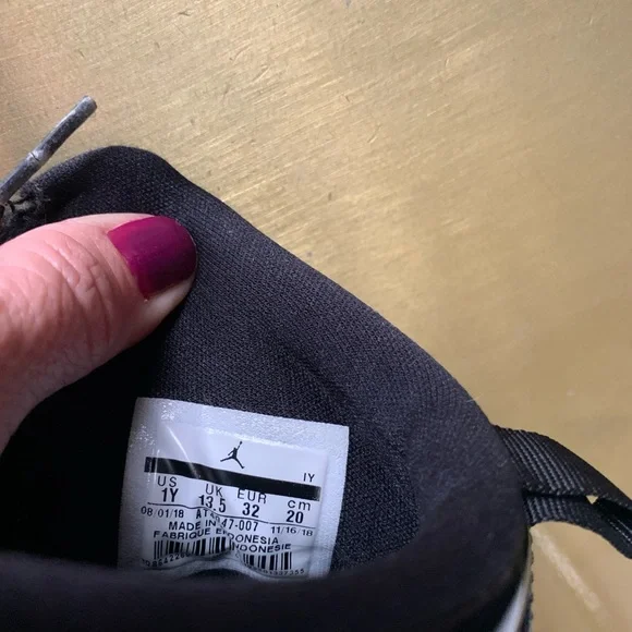 Air Jordan black and gold boys size 1